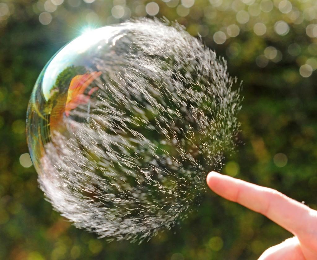 This App is Trying to Predict the Bitcoin Bubble Bursting Using AI